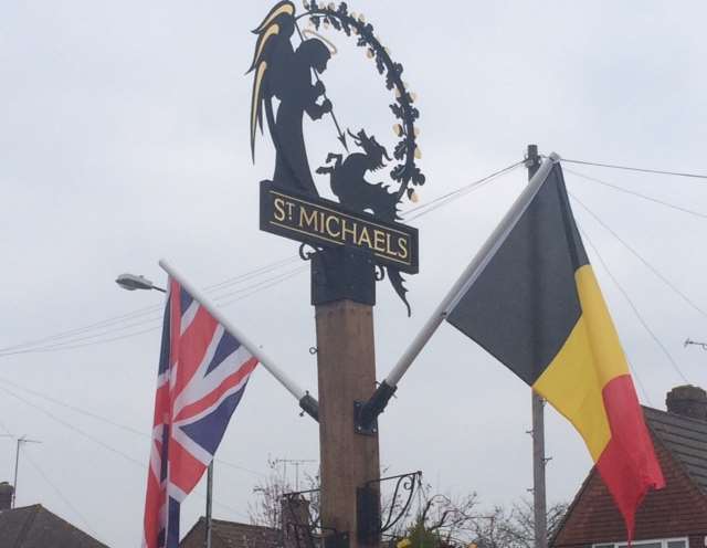 The Belgian flag has been raised next to the Union flag