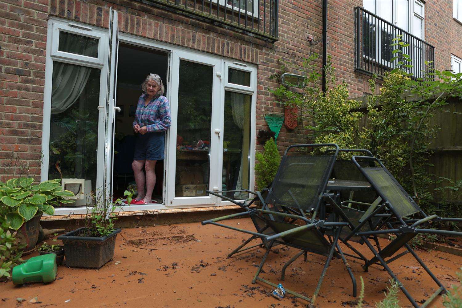 Rosabella Duffus has damage in her house after mud and clay flooded the area fom the building site up the road