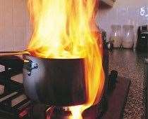 A pan of oil caught alight. Stock picture