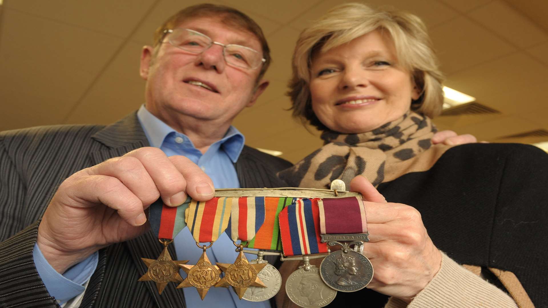Leonard and Anne Hazeldine were reunited with the medals stolen from their home in Maidstone. Picture: Steve Crispe