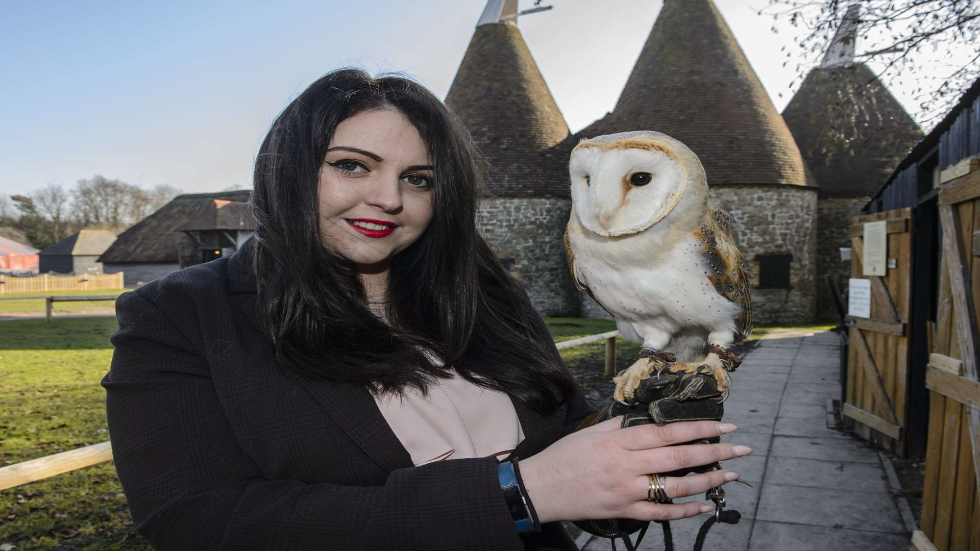 Mollie King, director and owner of the Kent Owl Academy, with barn owl Dawn