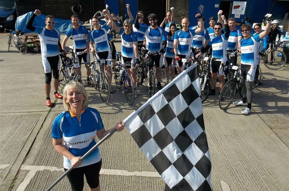 Melanie Rogers from Vattenfall, operators of Thanet Offshore Wind Farm, pictured waving the chequered flag at a prior KM Big Bike Ride event.