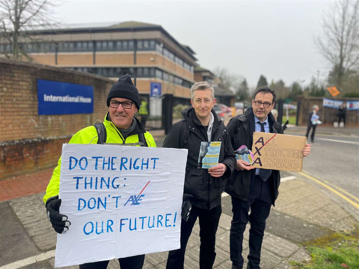The protesters held up placards and handed out flyers to employees. Picture: XR Tunbridge Wells