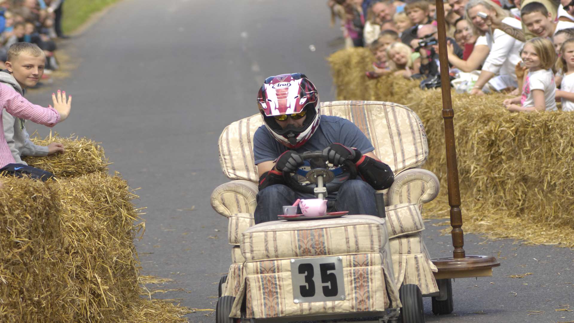 The homemade carts race down Aldington's hills, cheered on by thousands of spectators