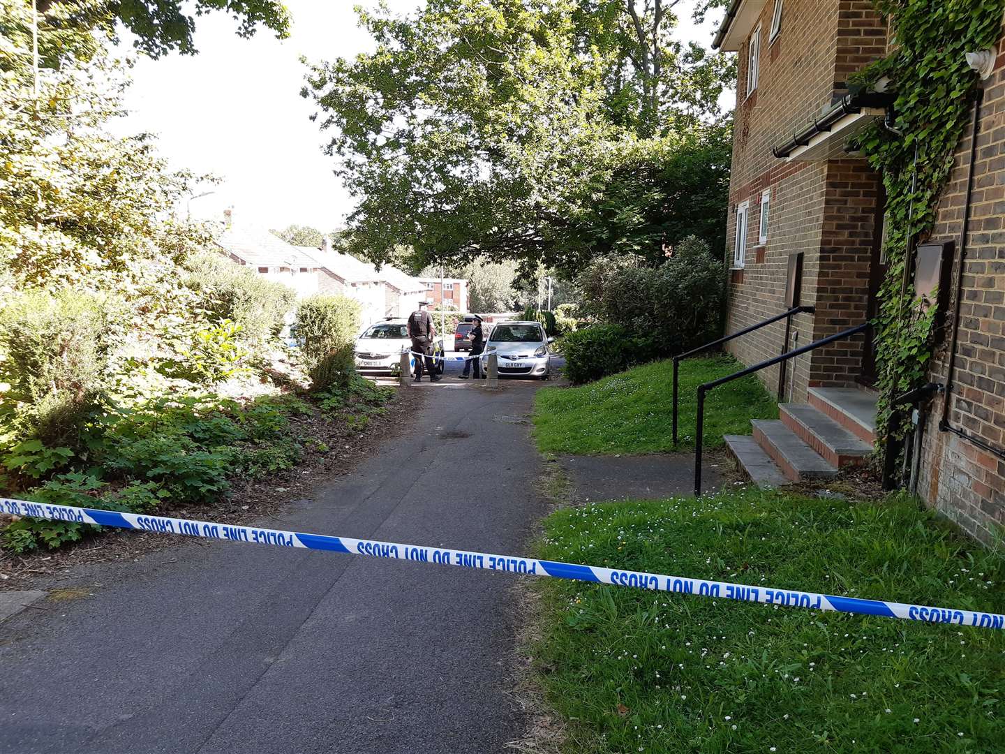 Police have taped off part of a footpath between Grampion Close and Canterbury Road