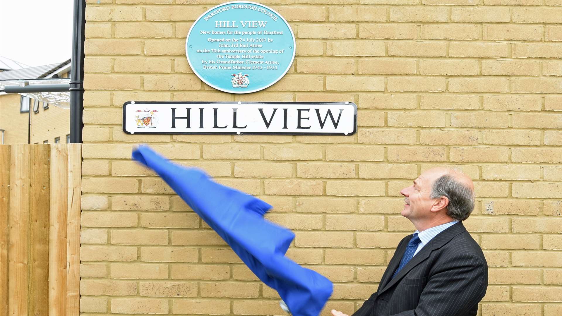 Lord John Attlee, grandson of Clement, unveils a commemorative plaque