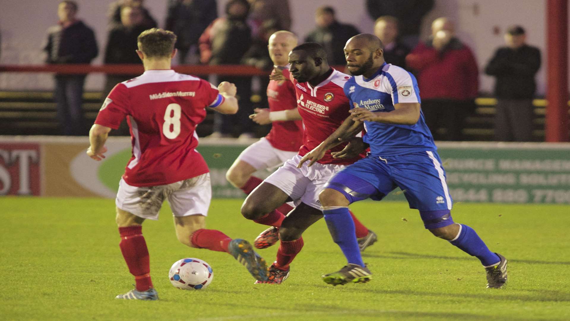 Dean Rance and Anthony Acheampong get stuck in against Welling in the FA Trophy Picture: Andy Payton