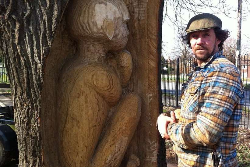 Daniel Hilton carving the tree at Victoria recreation ground in Canterbury