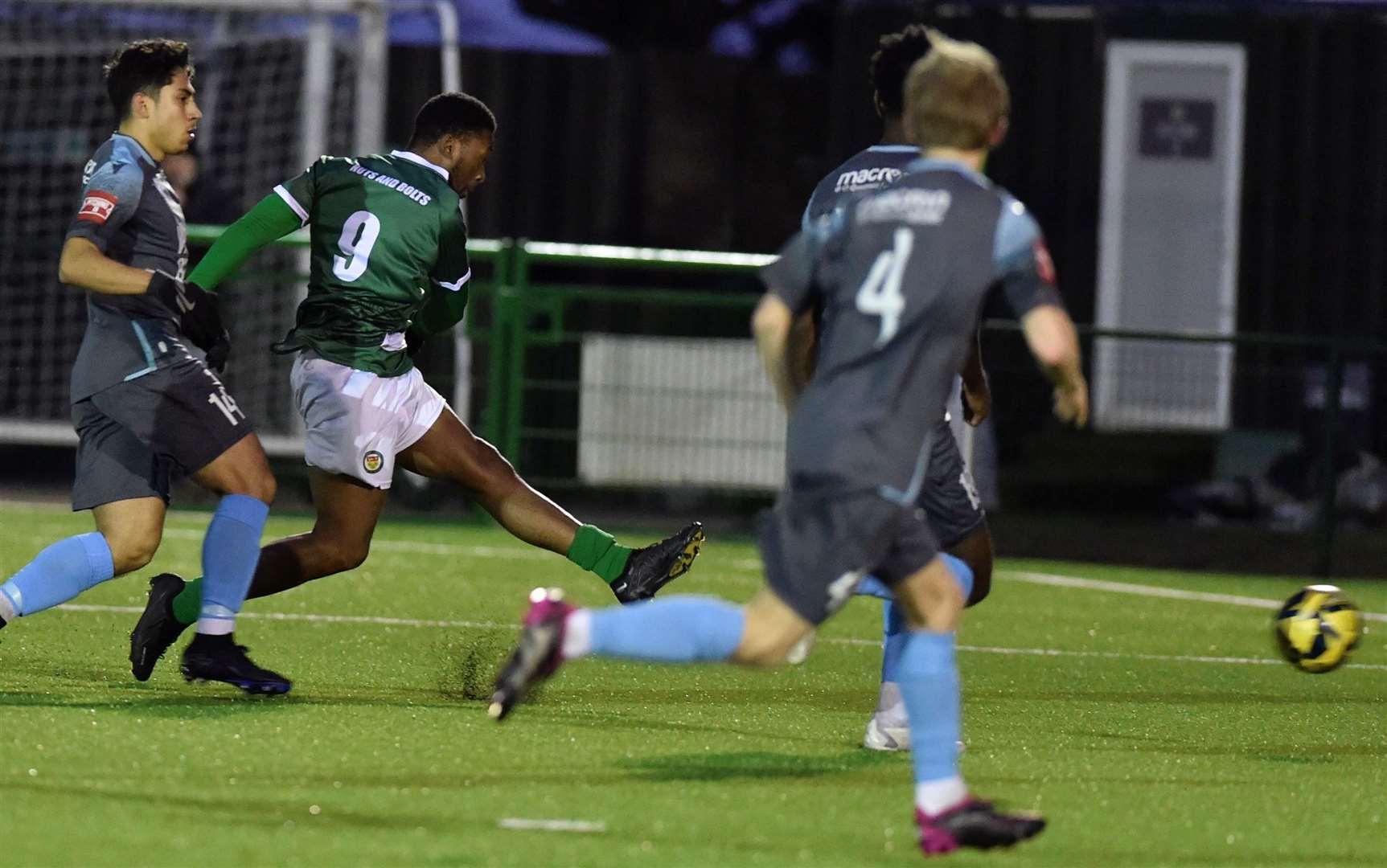 Vance Bola scores Ashford’s equaliser against Three Bridges on Saturday. Picture: Ian Scammell