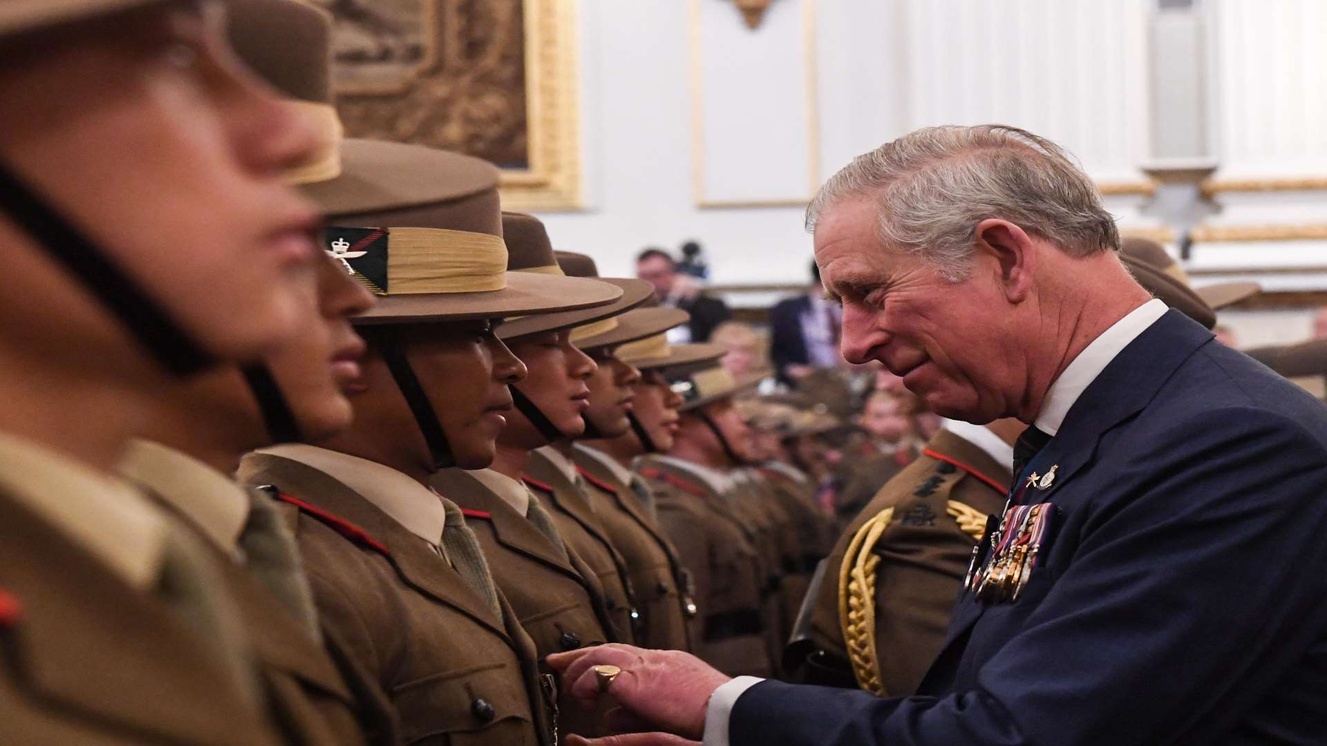 Prince Charles, presenting a soldier his medal, is also celebrating 40 years as colonel-in-chief of the regiment. Picture: Crown copyright/Cpl Steve Duncombe