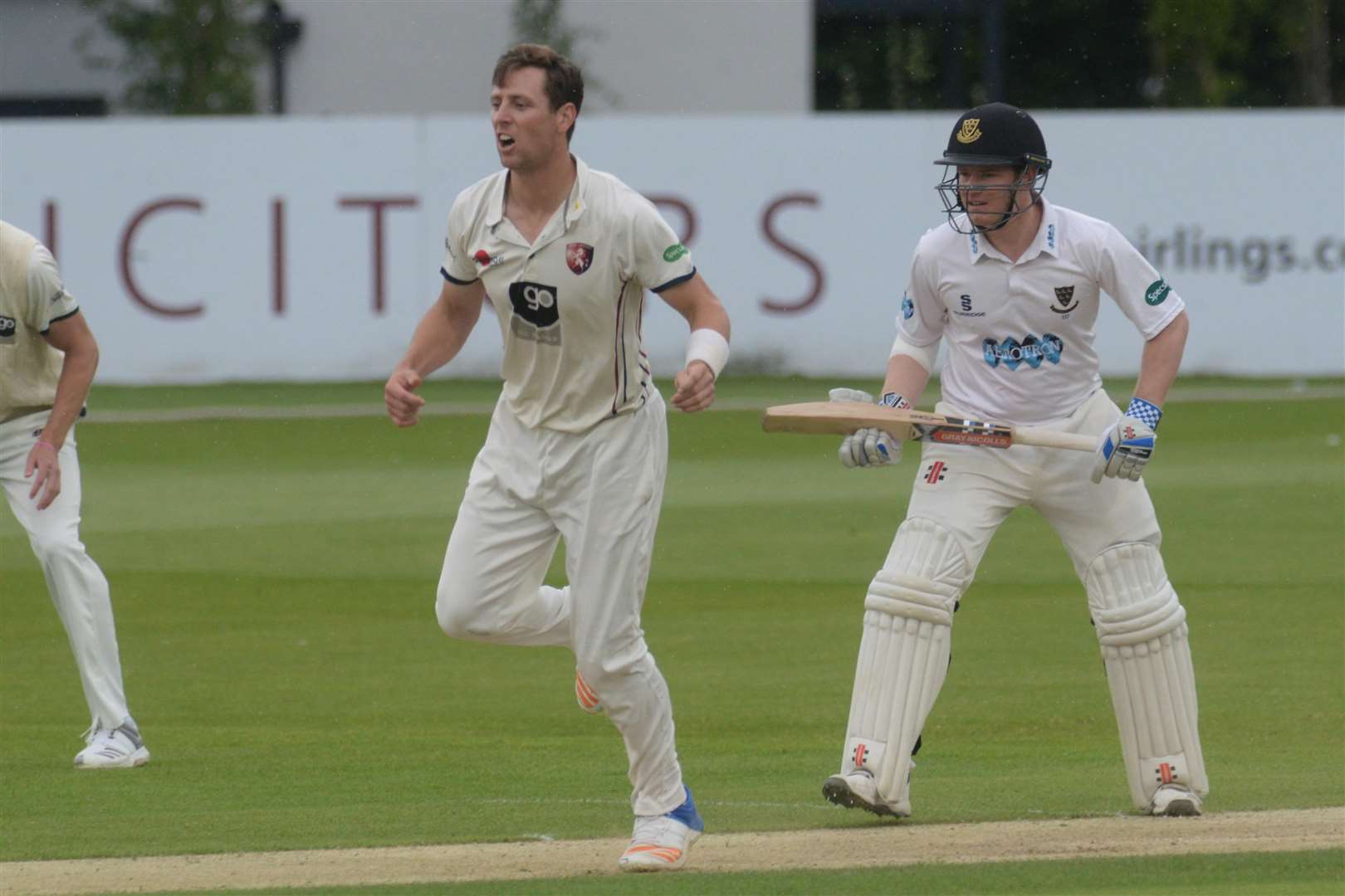 Sussex batsman and captain Ben Brown and Kent's Matt Henry in action. Picture: Chris Davey