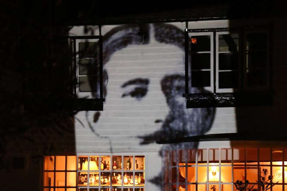 Images of the Goudhurst veterans who died in the First World War were projected onto the wall of The Vine. Image by Antony Rowse