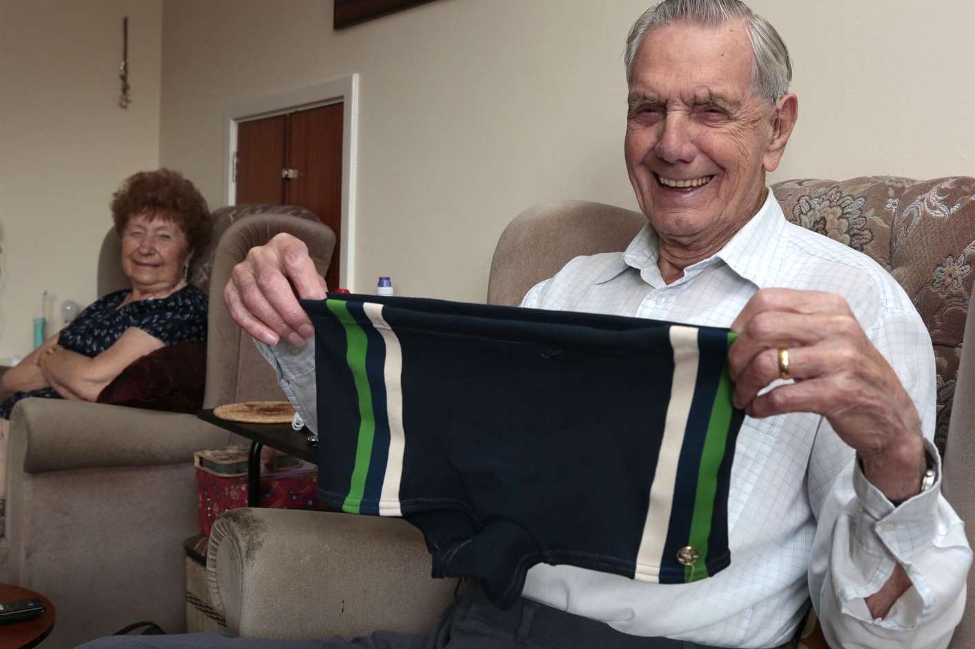 Charlie Pallett, 93, with his swimming trunks from the Sixties