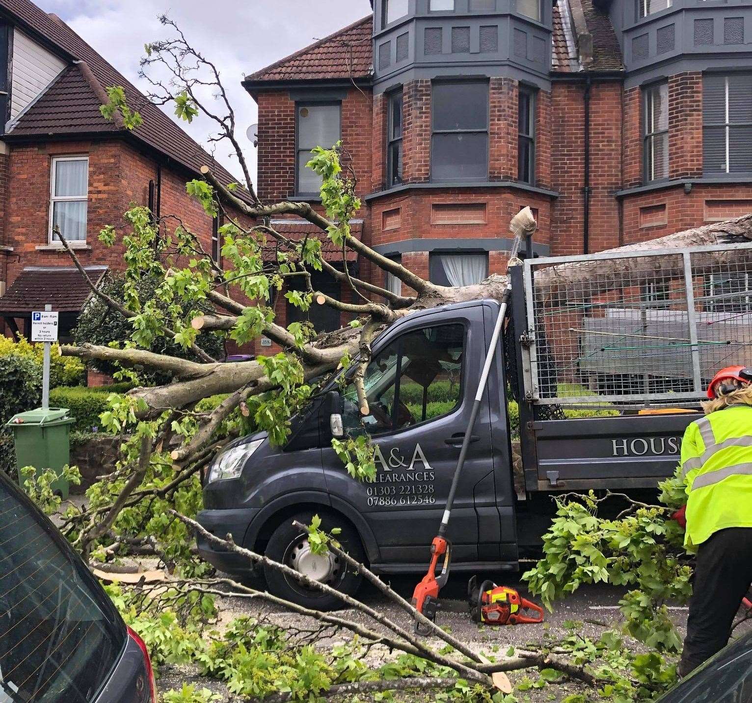 The van for A&A Clearances was parked when the tree hit it. Photo: Peter Phillips