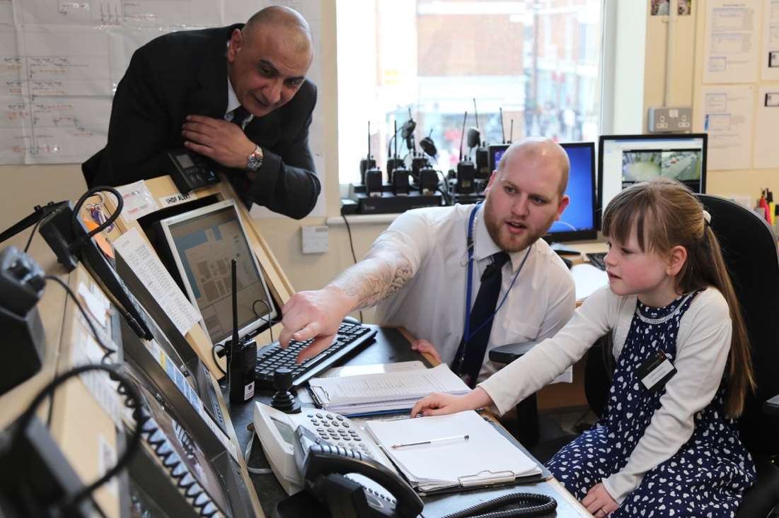 Security Officers Darius Farzaneh and Dave Hay brief Elizabeth Cooper on the operation of the CCTV room at Whitefriars.