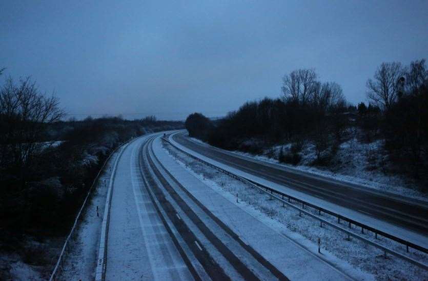 Snow fell overnight leading to tricky driving conditions - this is the closed part of the M20 near Maidstone. Picture: UKNiP