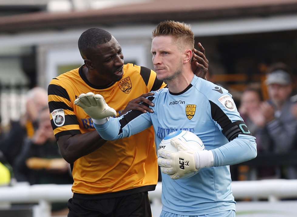 Anthony Acheampong with Maidstone captain Lee Worgan Picture: Matthew Walker