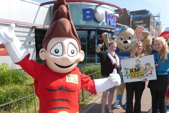 Staff at AMF Bowling Ashford announce support of the walk to school campaign. Wowzer the walk to school mascot meets Charly Ward, Tracy Wratten and Jordan Fuller.