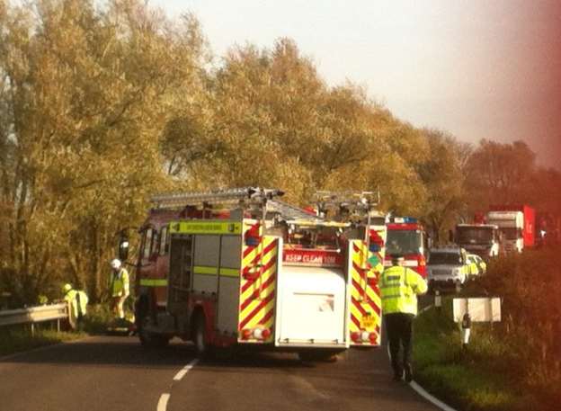 A person is trapped after a crash on Romney Marsh.