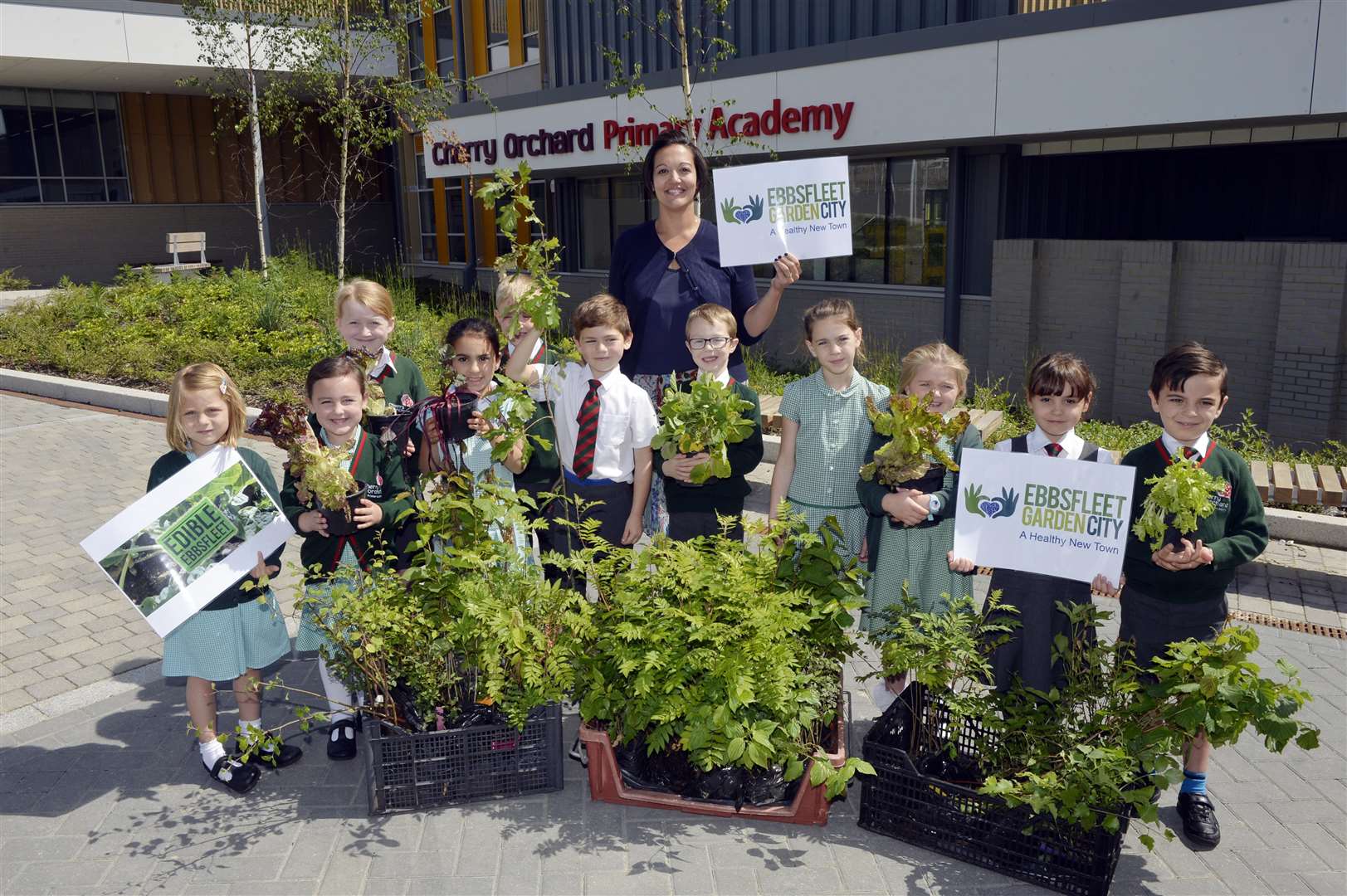 Cherry Orchard Primary School teacher Sabina Borthwick with pupils and the plants (2429575)