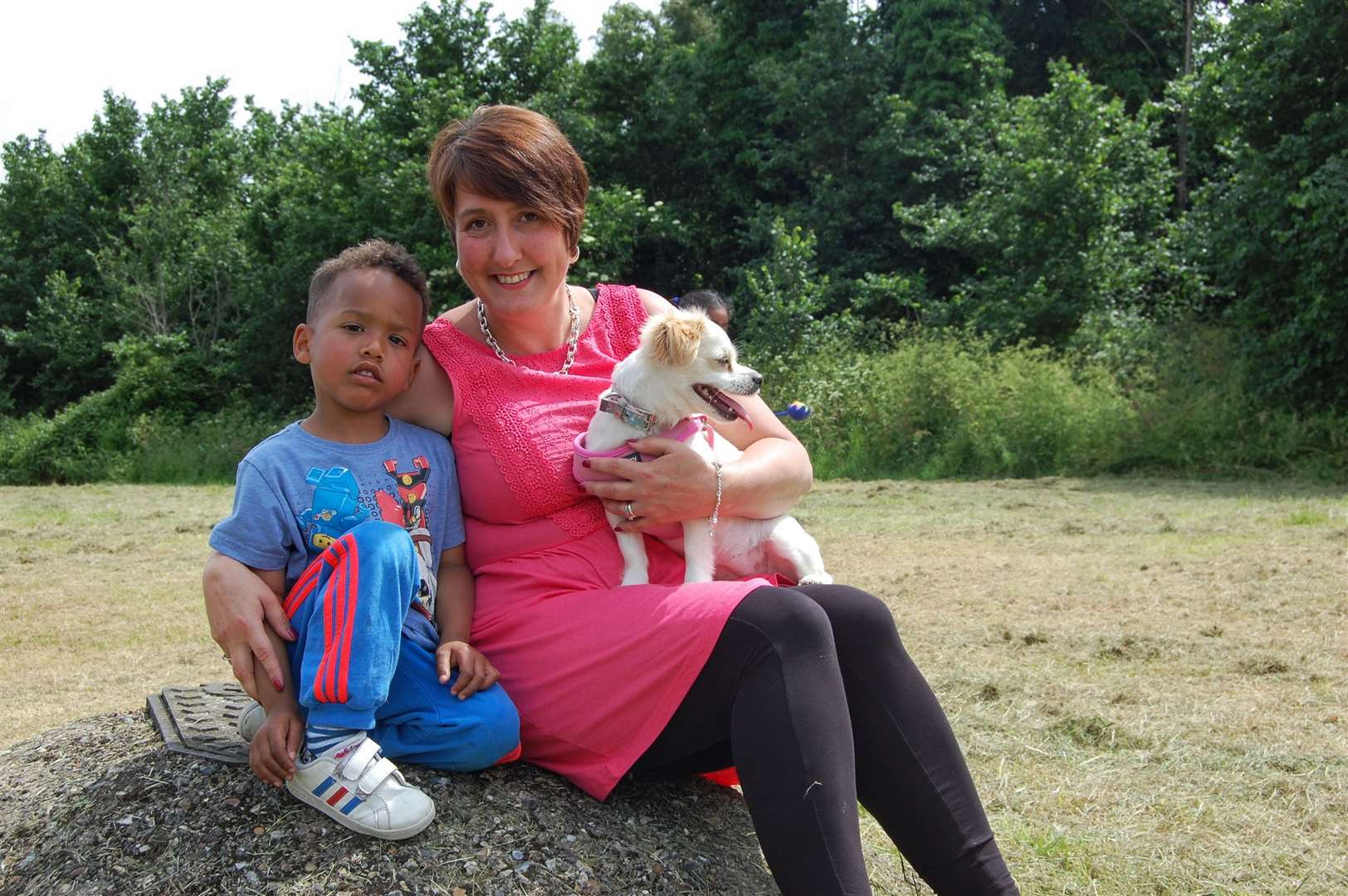 Lanette Safo-Wiltshire, 42, of Shaftesbury Lane, with son Kobe, four, and dog Jess.