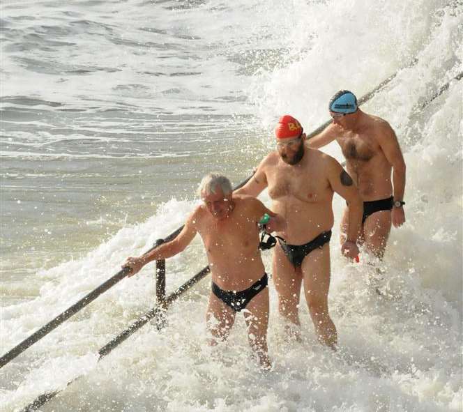 Cross-Channel swimmers brave the water in Folkestone despite high tides
