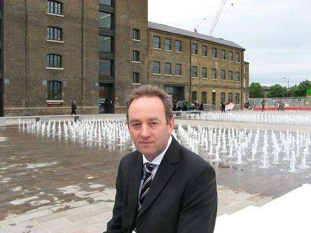 David Bracey, director of The Fountain Workshop, in front of some of the water jets in Granary Square, Kings Cross