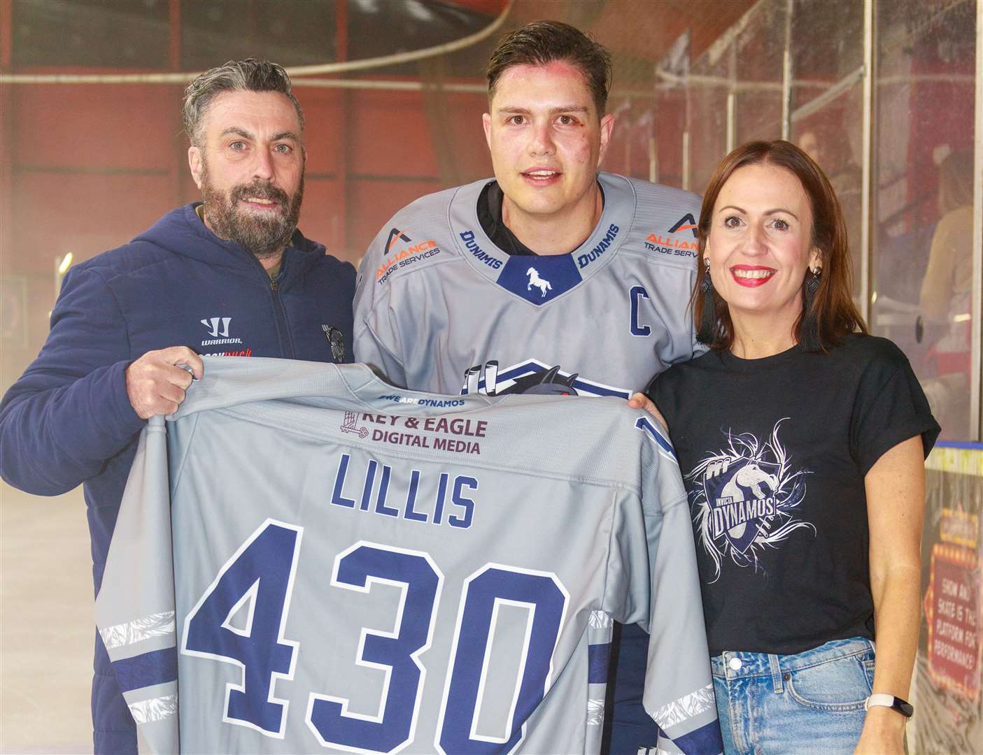 Invicta Dynamos’ 2023/24 captain Harrison Lillis with club owners Kevin and Sarah Parrish as he makes a club-record 430th appearance Picture: David Trevallion