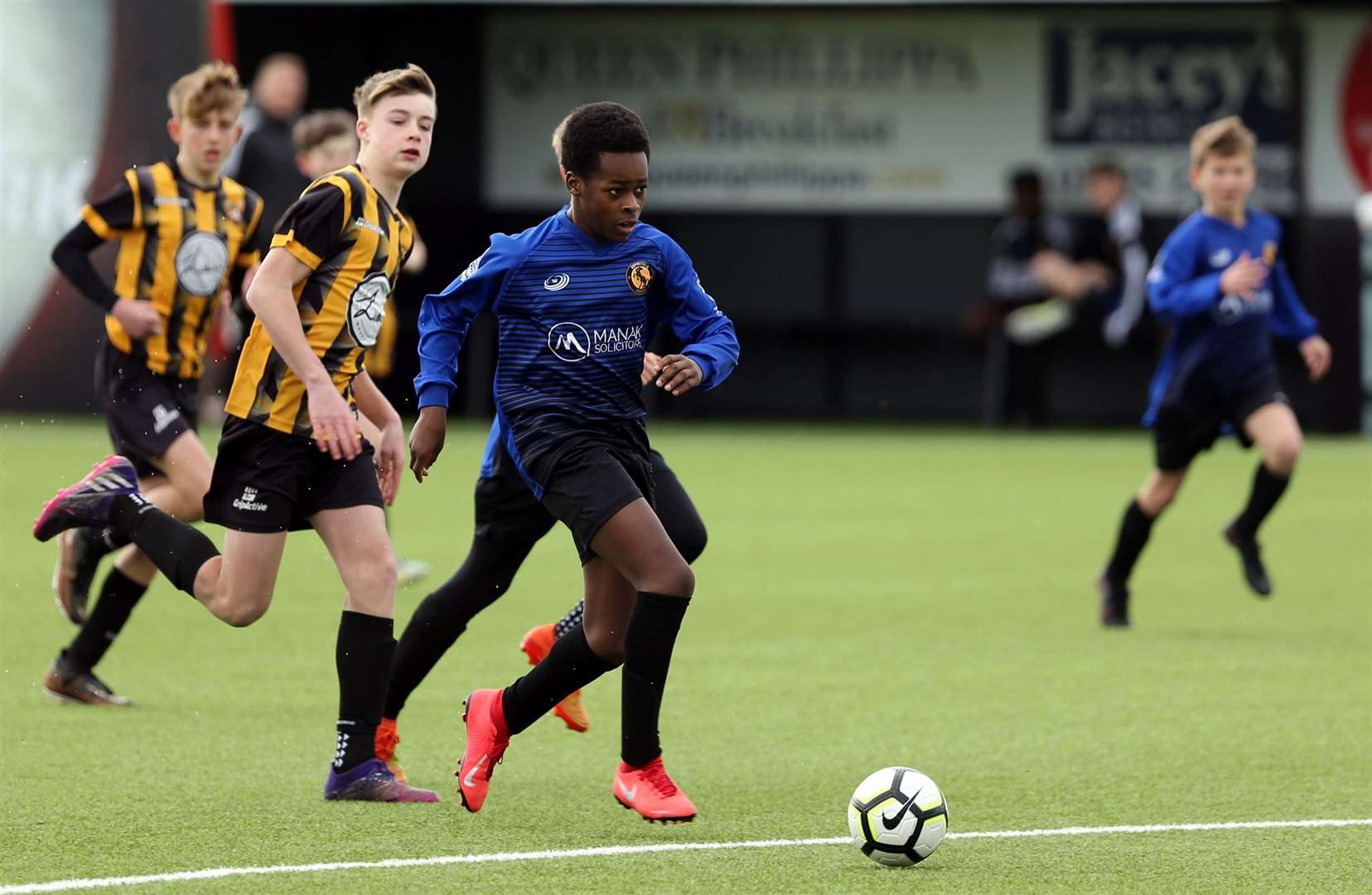Orpington under-13s striker Richard Ojo races clear of the Folkestone Invicta defence. Picture: PSP Images
