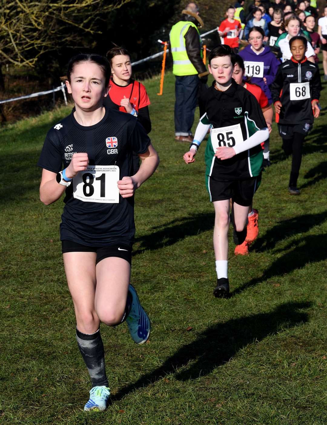No.81, Ava-Mai Malone, and No.85, Ettie Winser, both racing for Maidstone in the Year 7 girls' event. Picture: Simon Hildrew (62005821)