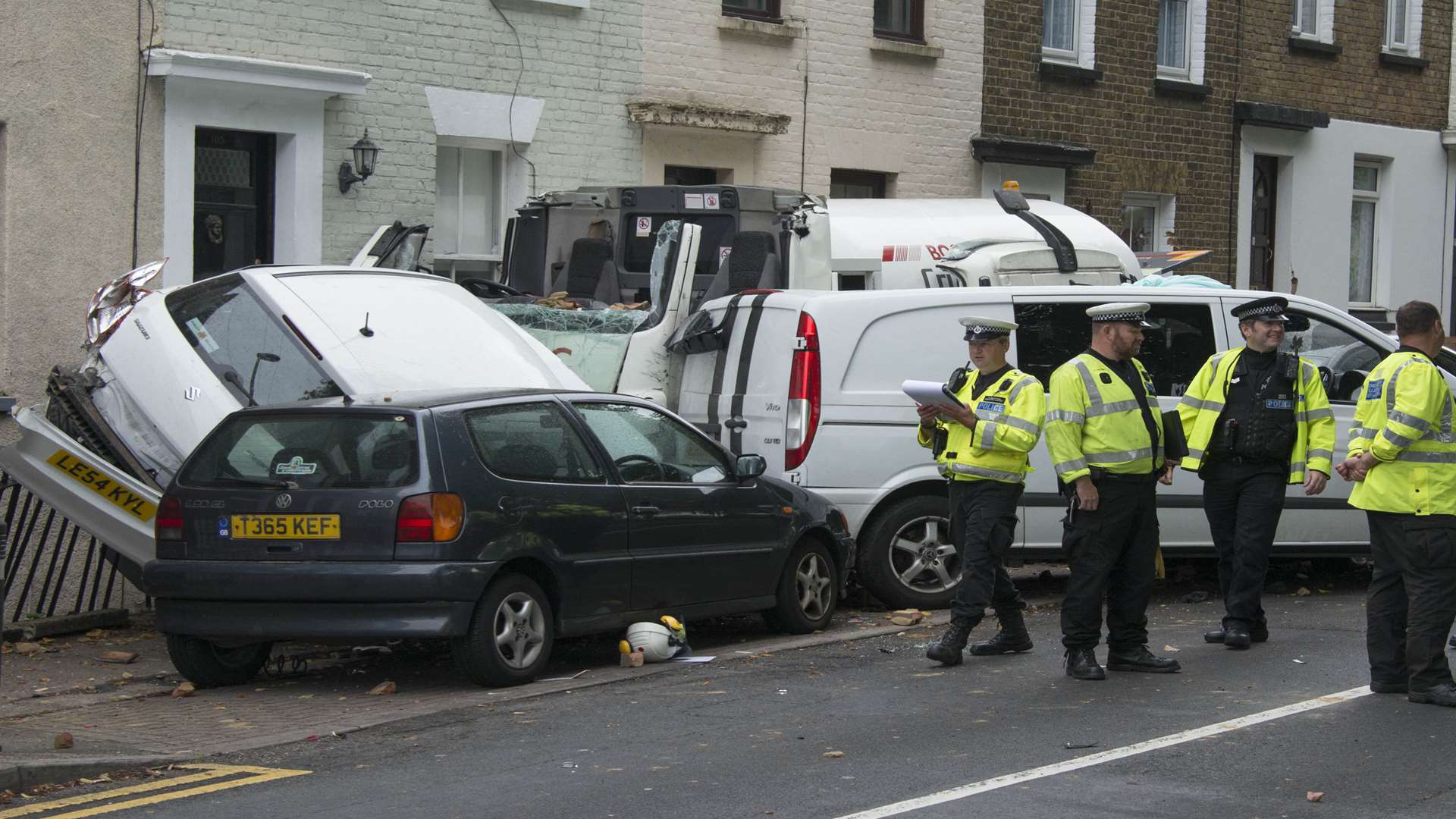 Police at the scene of the crash. Picture: Steve Pointer.