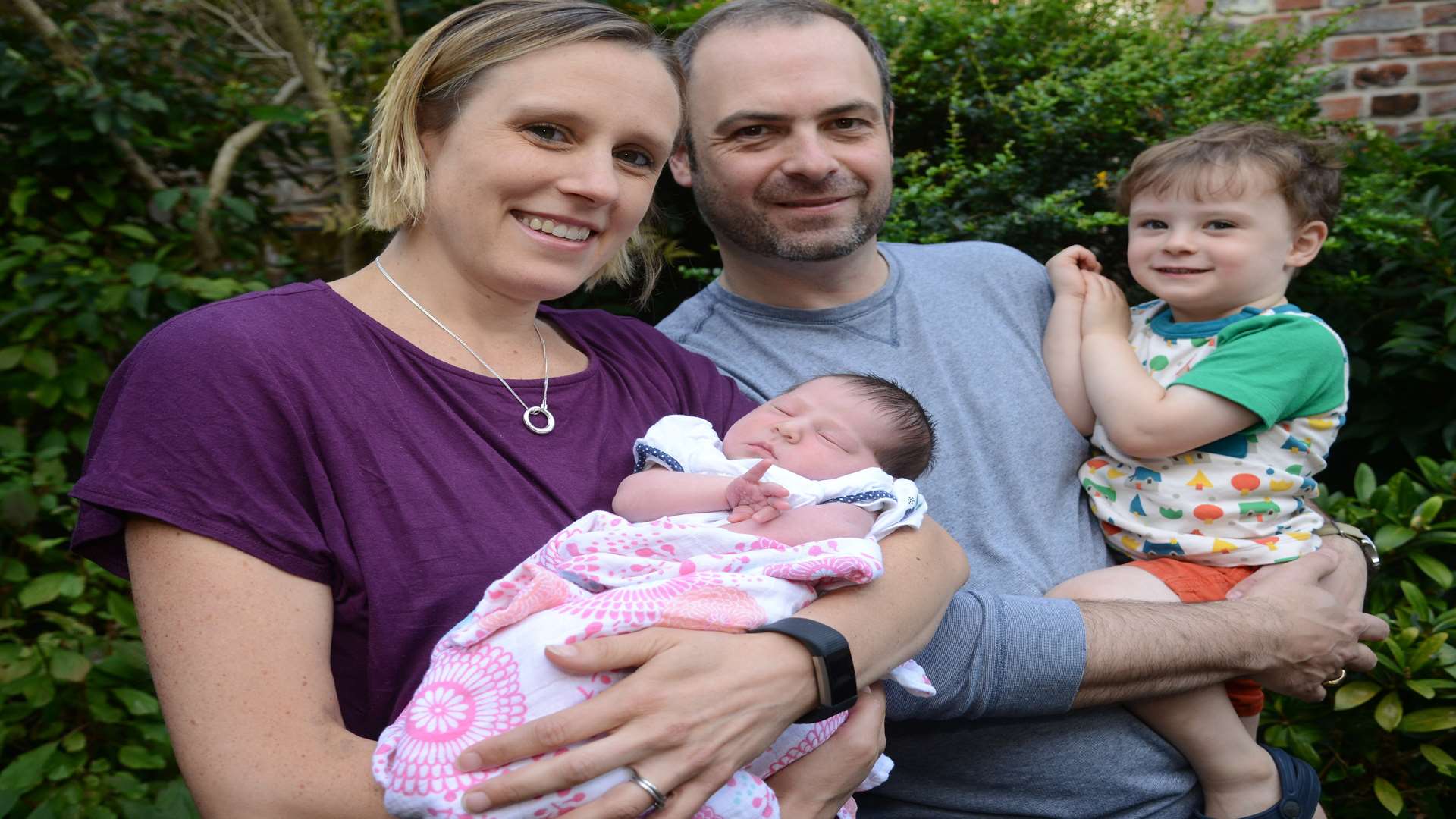 Brianne and David Hamilton with son Patrick and daughter Madeleine who was born in a hospital car park