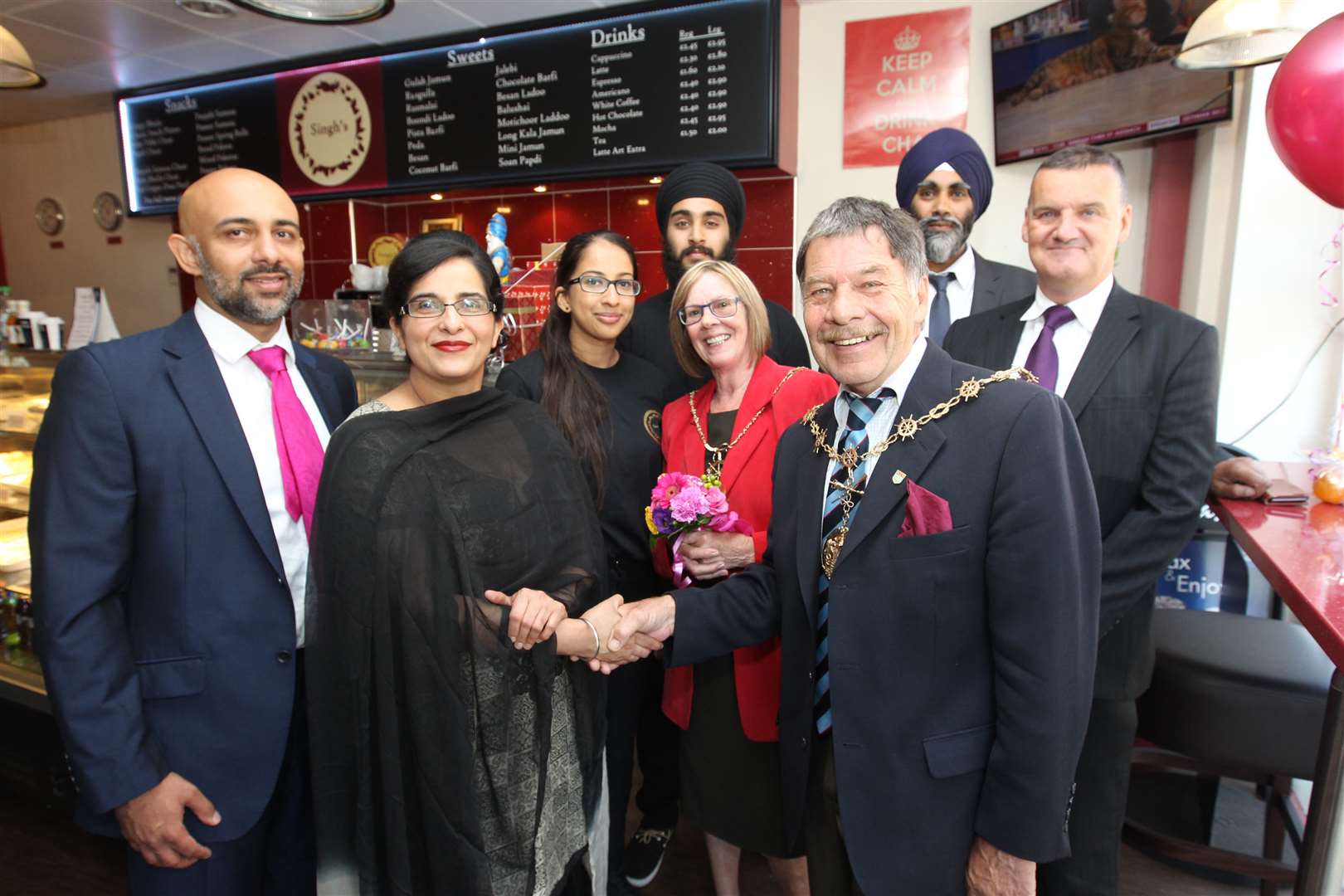 The Mayor of Gravesham Cllr Mick Wenban and Mayoress Fiona Strike JP, greet Singh's co-owner Jaspreet Lalli flanked by Natwest relationship manager Rav Sall, far left, and Natwest director of business banks Alan Andrews, far right, plus family members