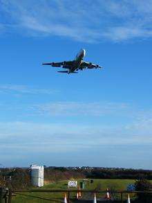 An aeroplane prepares to land at Kent International Airport, Manston