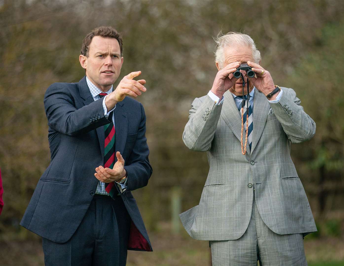 Gareth Fulton, Elmley Nature Reserve manager and HRH The Prince of Wales bird watching during a visit to Elmley. Picture: Elmley National Nature Reserve