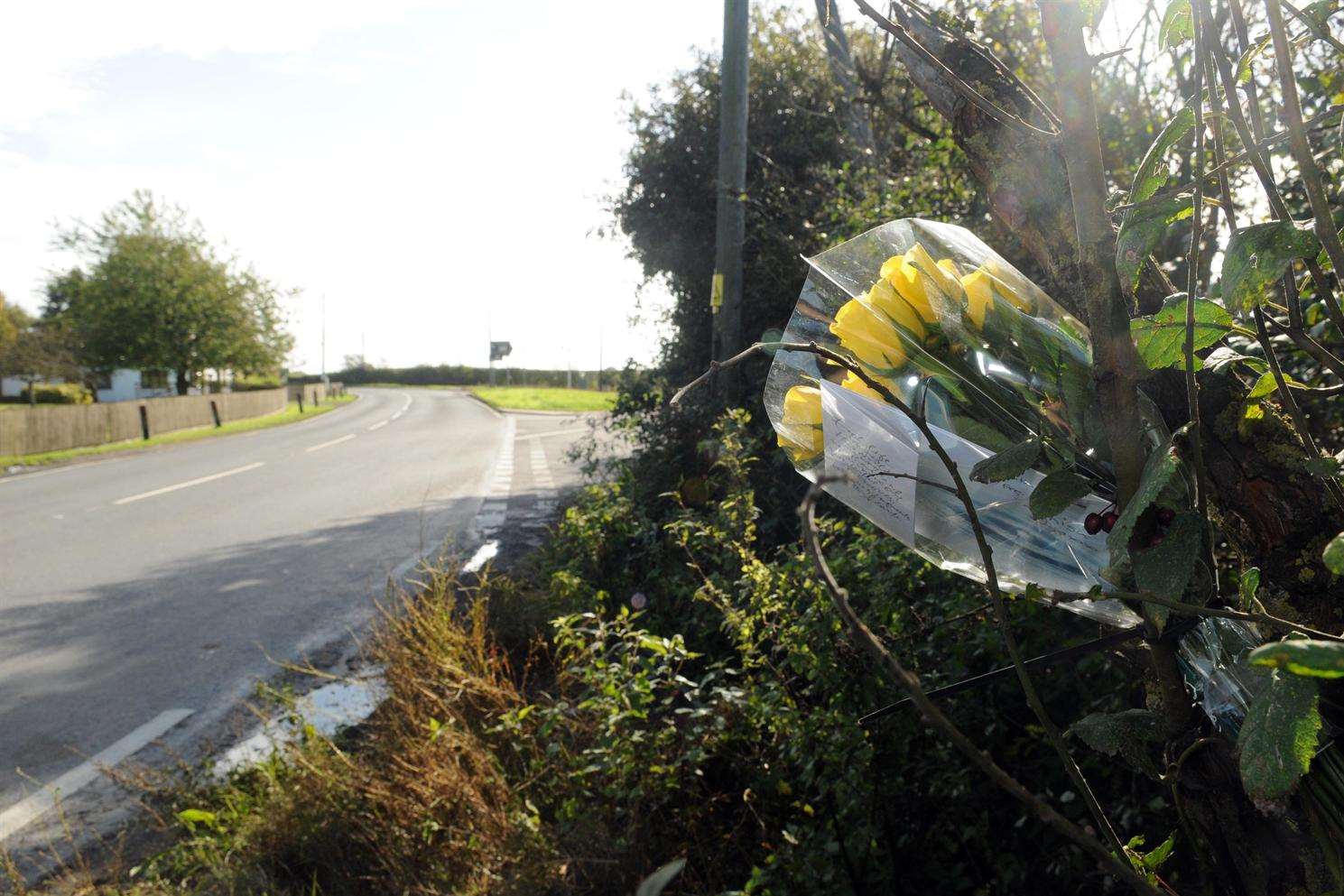 A floral tribute left at the scene of the fatal crash