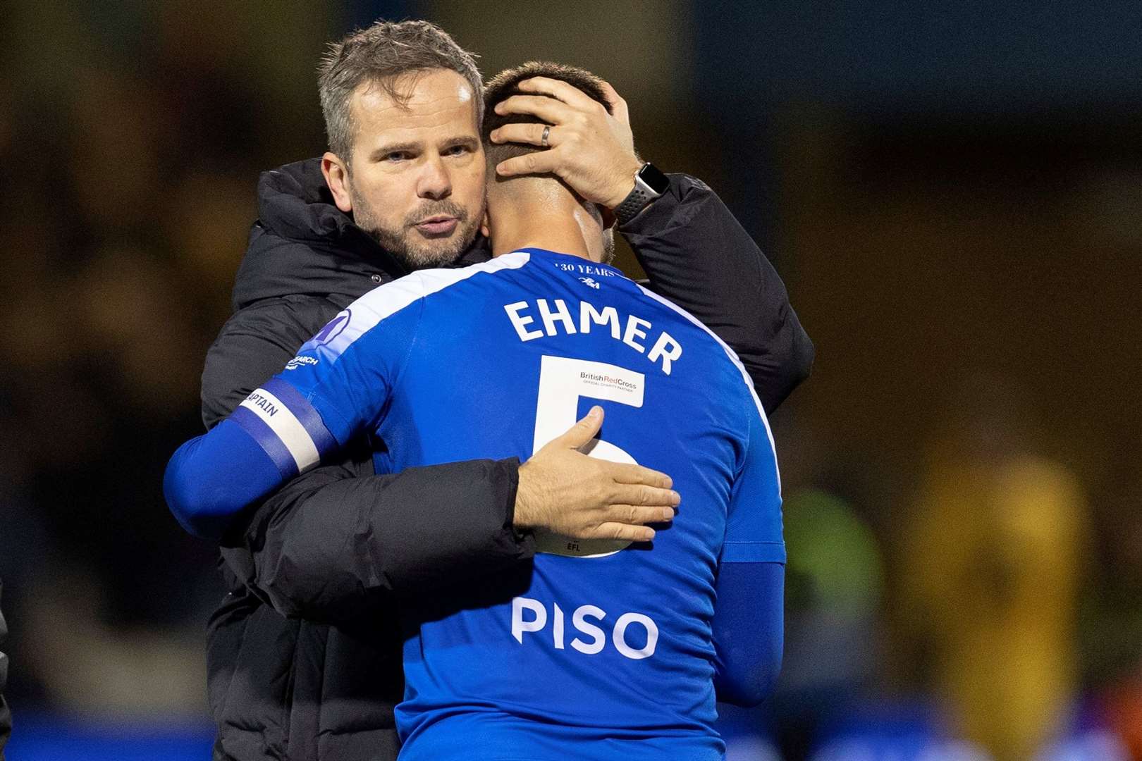 Head coach Stephen Clemence congratulates Max Ehmer after a 1-0 win for Gillingham over Sutton Picture: @Julian_KPI