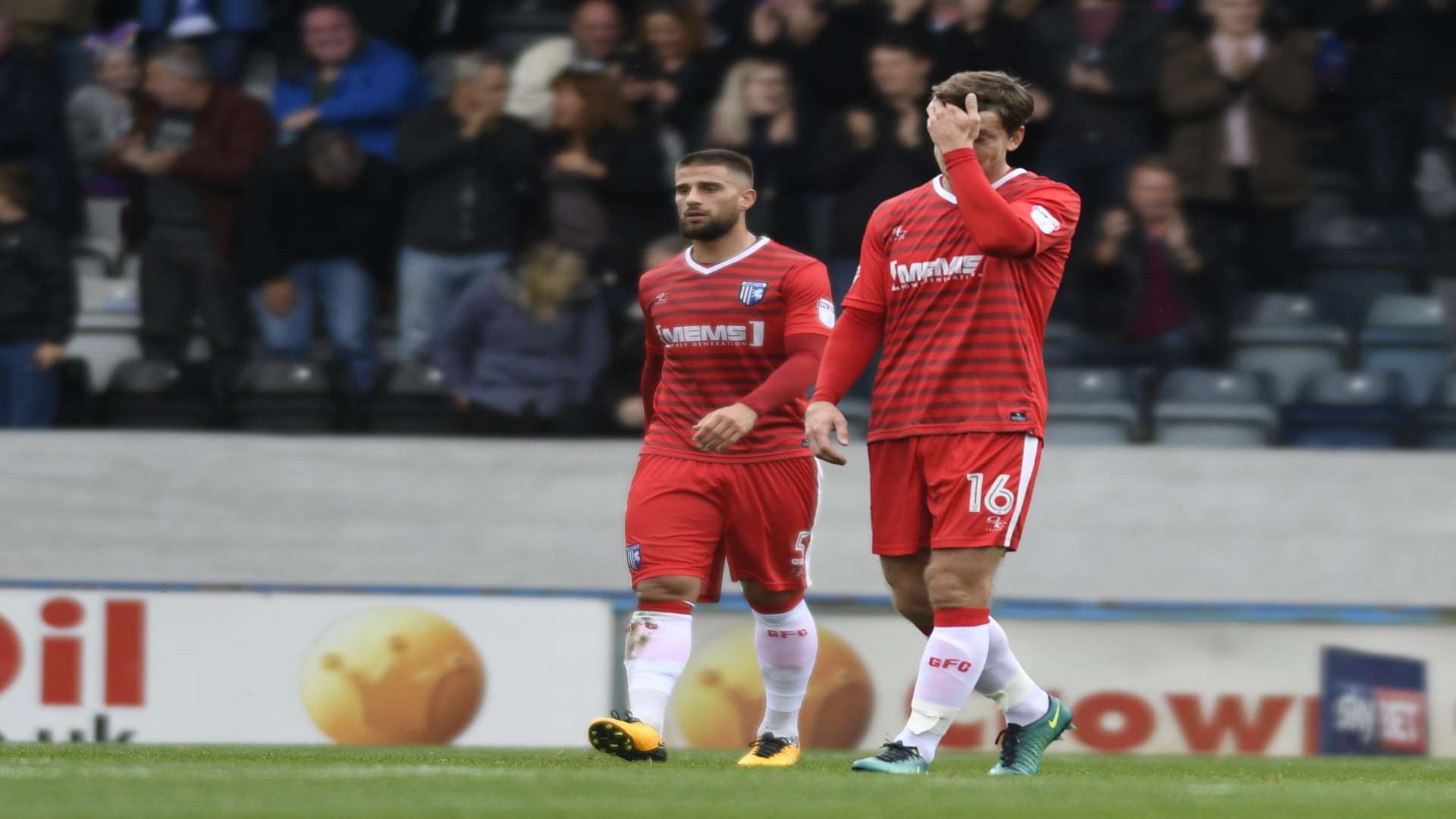 Dismay at the back after Gills concede a second at Rochdale Picture: Barry Goodwin