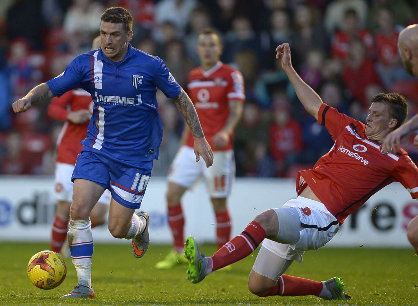Gills striker Cody McDonald evades a Walsall challenge. Picture: Barry Goodwin