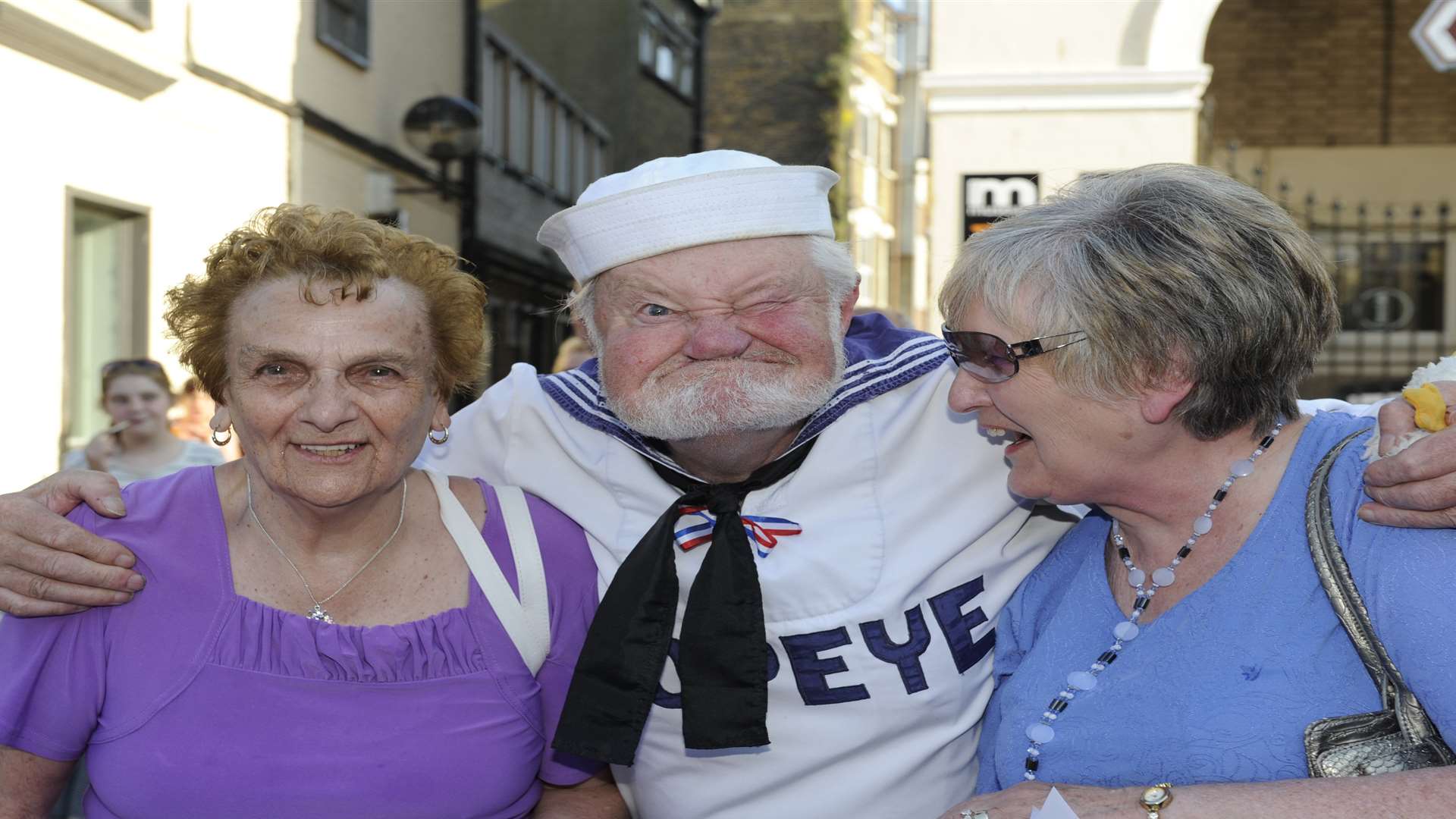 Popeye poses with Gerti and Val at Dover Carnival in 2013