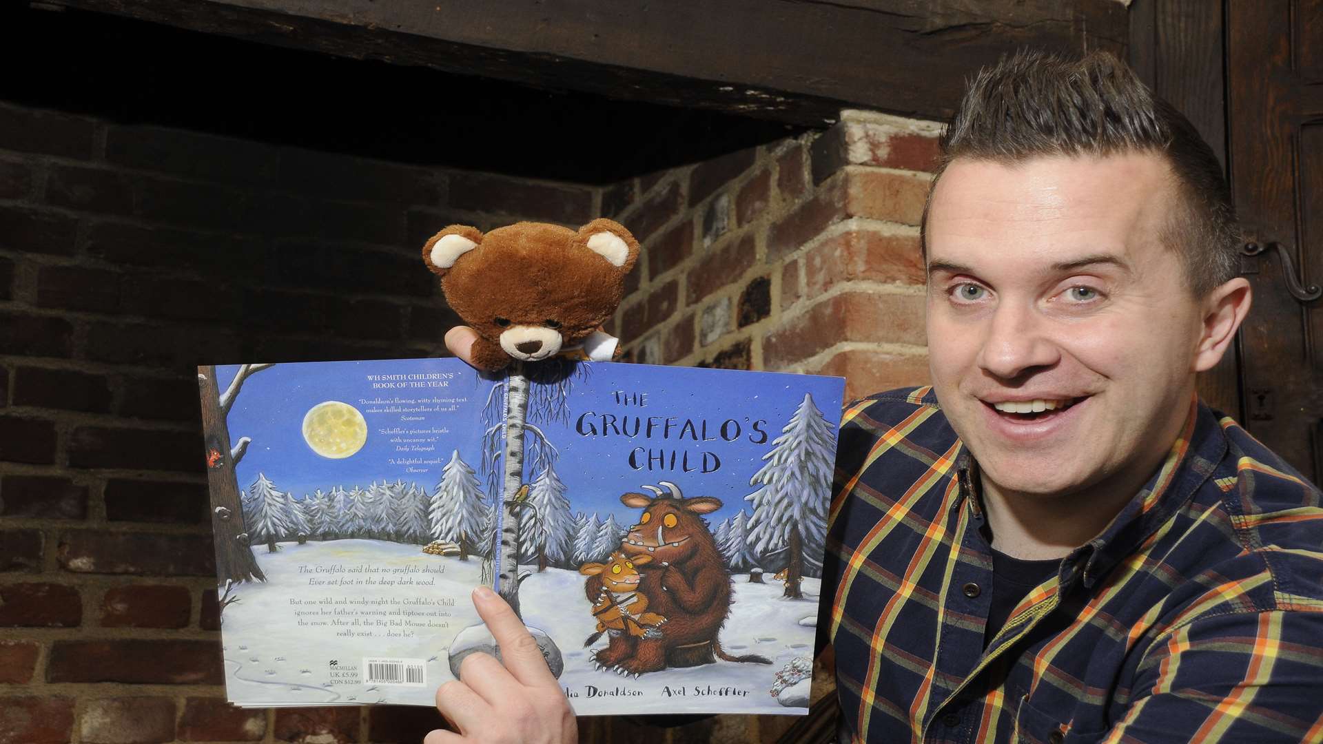 Phil Gallagher Mister Maker from the CBeebies television children show is ready to visit winning school