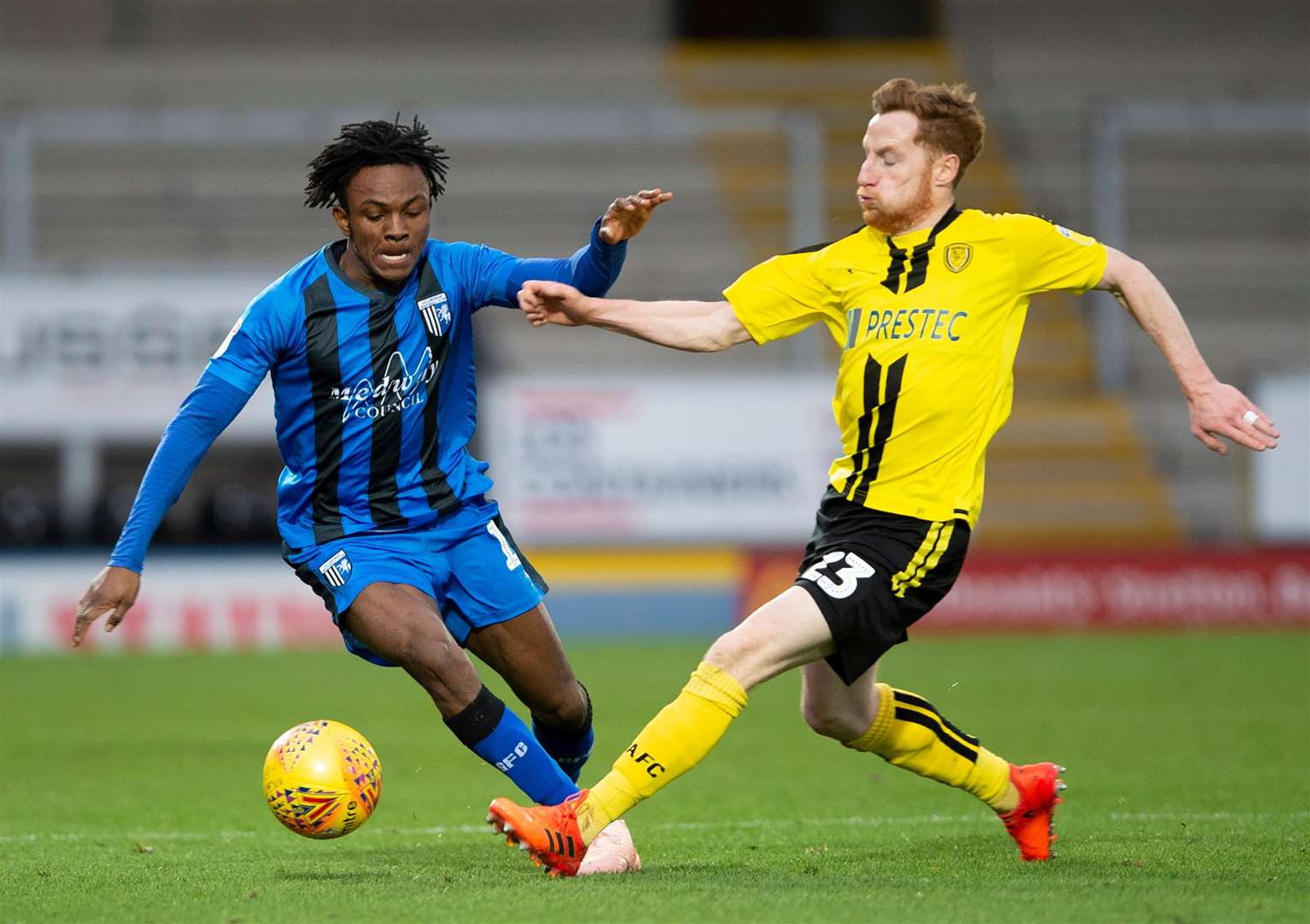 Regan Charles-Cook takes on Burton's Stephen Quinn Picture: Ady Kerry