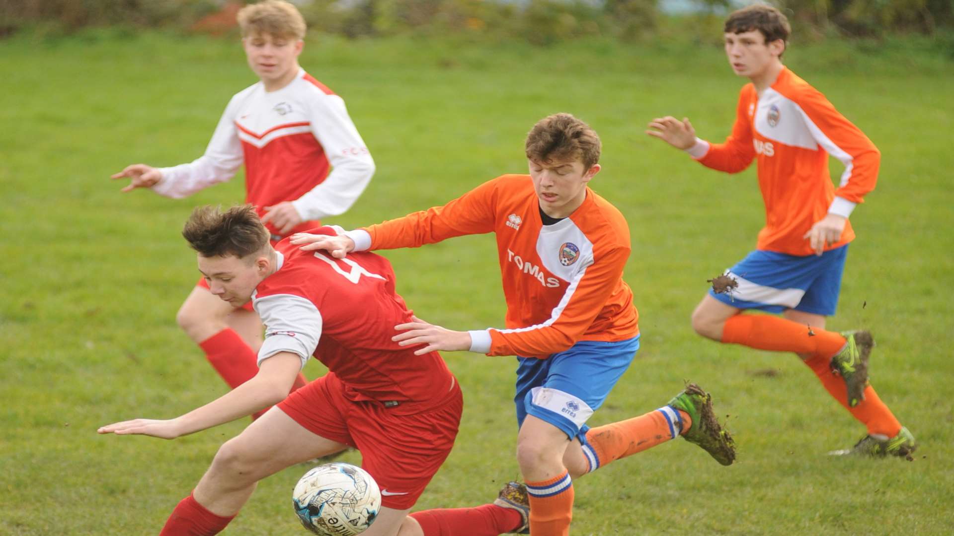 Rainham Eagles (red) under pressure from Cuxton 91 in the Under-16 League Cup second round Picture: Steve Crispe