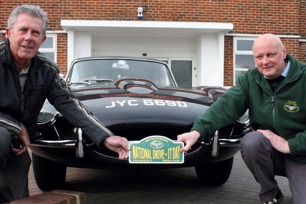 Mick Tillot (left) with his 1966 Series 1 Jaguar FHC 4.2 E Type, being handed his grille plaque by Event Organiser Martin Emmerson. Picture Andrew Worwood.