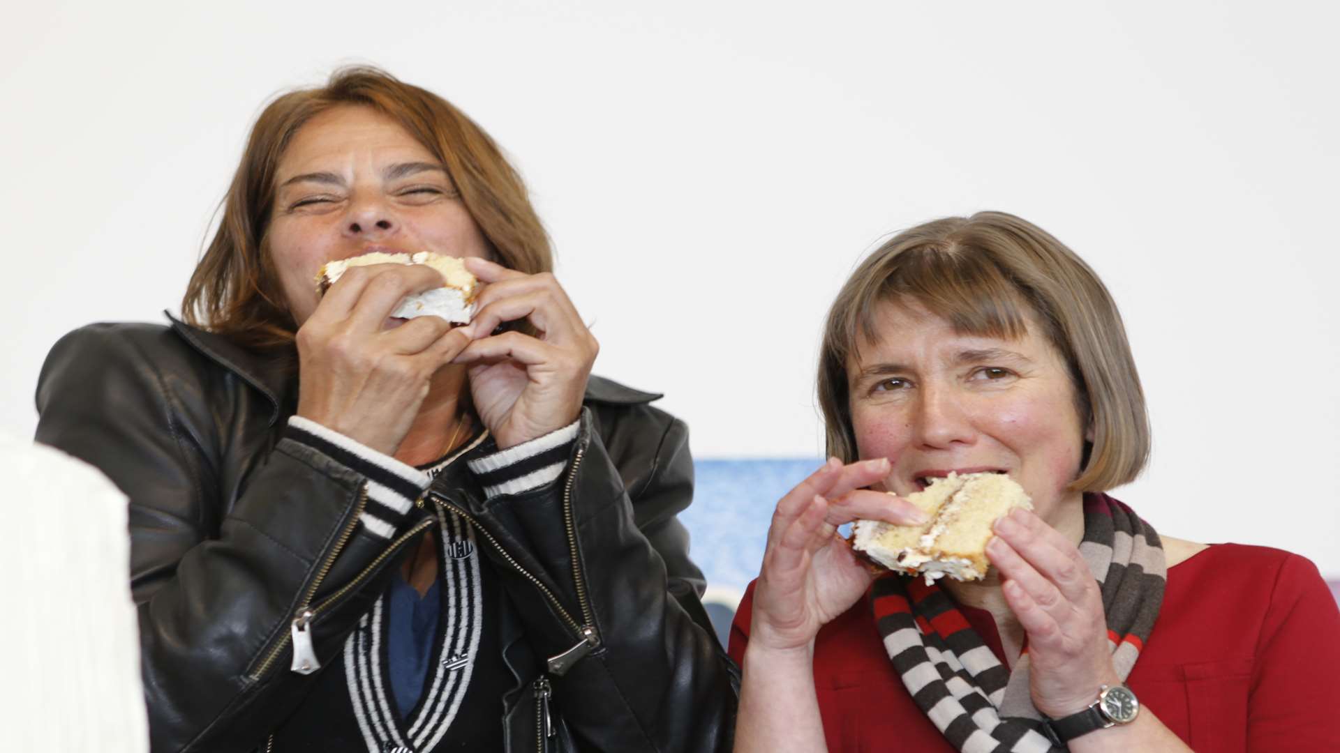 Tracey Emin and Victoria Pomery enjoy the cake together.