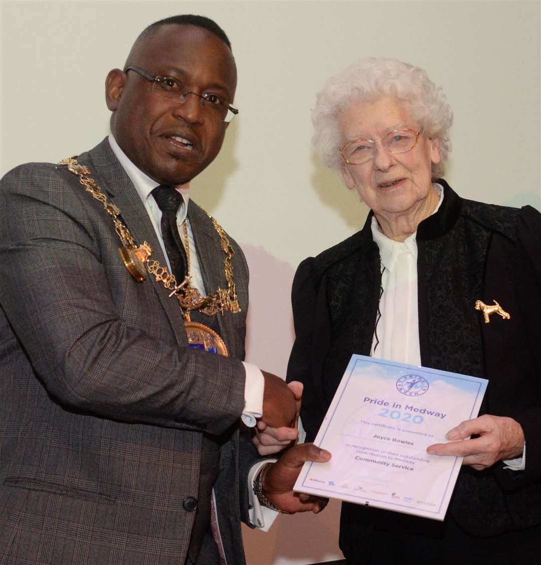 Mayor Cllr Habib Tejan presents Joyce Bowles with her certificate at the Pride in Medway Awards in 2020