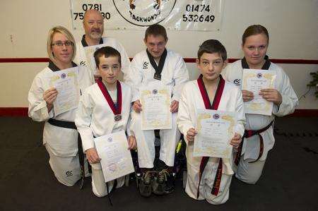 Martial arts class (from left): Katie Bignell, Brian Gadd, Tom Gadd, 12, Paul Irons, James Tubbs, 14, and Lauren Bignell, 13