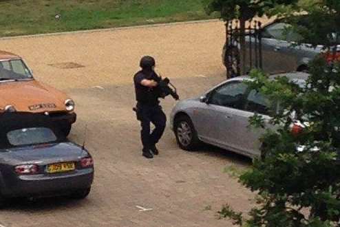 An armed officer at the scene of the South Darenth 'stabbing'