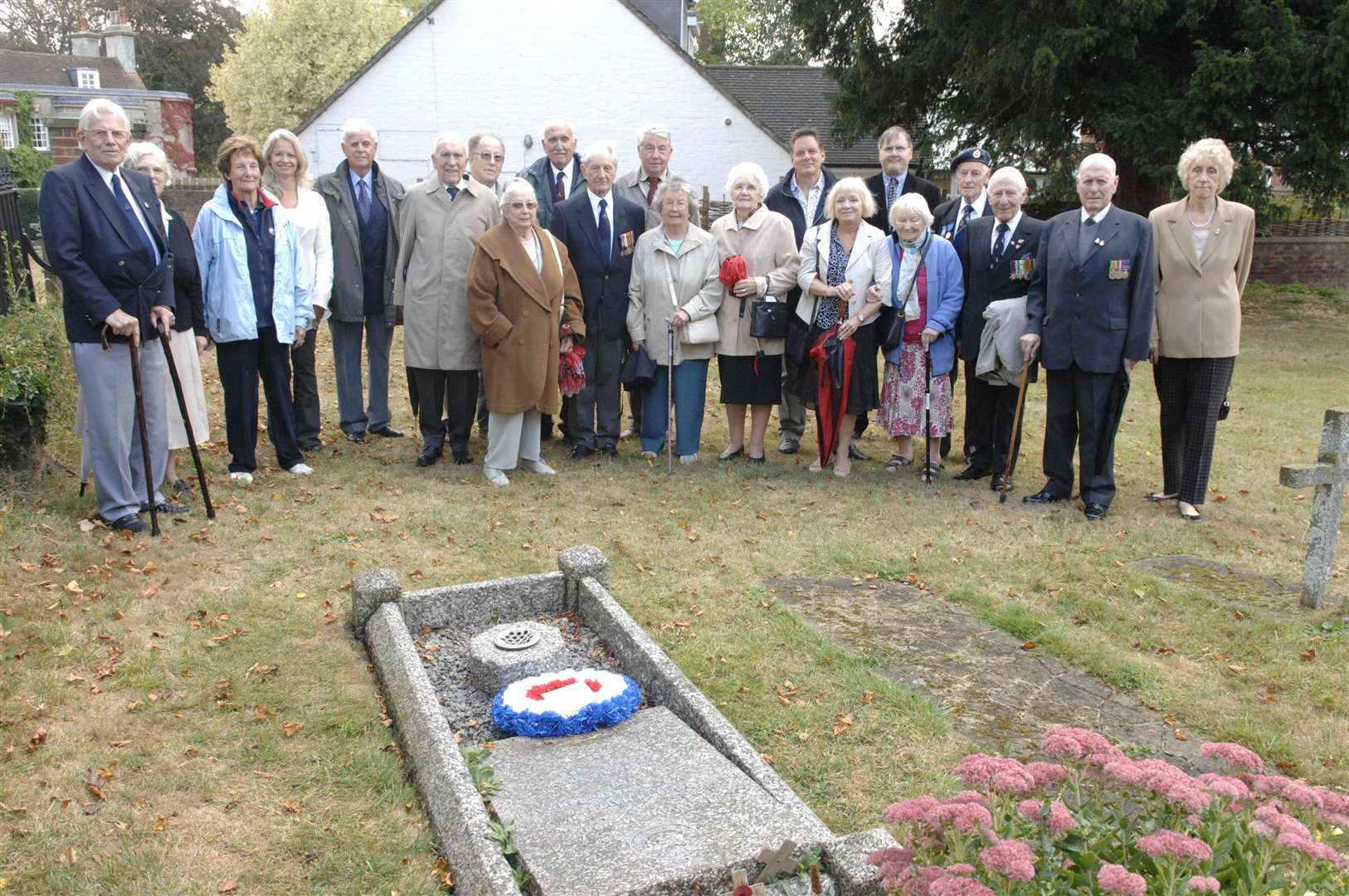 Family and friends at Squadron Leader David Maltby’s grave