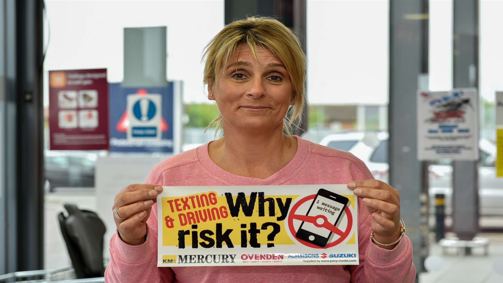 Tracy Squire, Mum of Daniel Squire, a teenage cyclist who was killed after being knocked off his bike, gave out Why Risk It? stickers against texting while driving